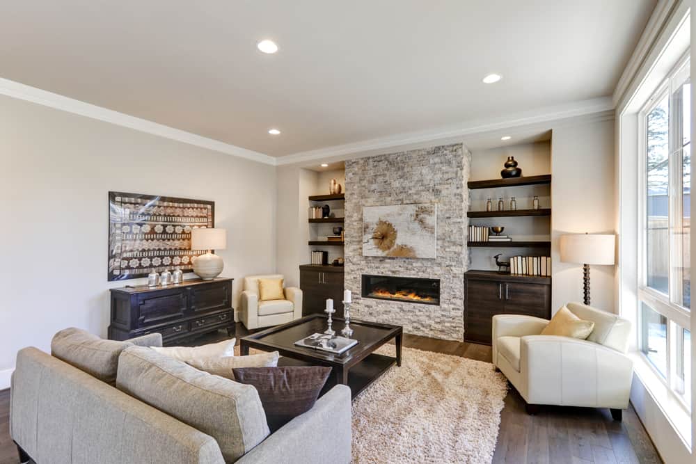 Family room addition with a fireplace and built-ins